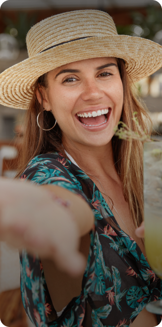 Margaritaville - Section Columns Images - woman smiling at the beach